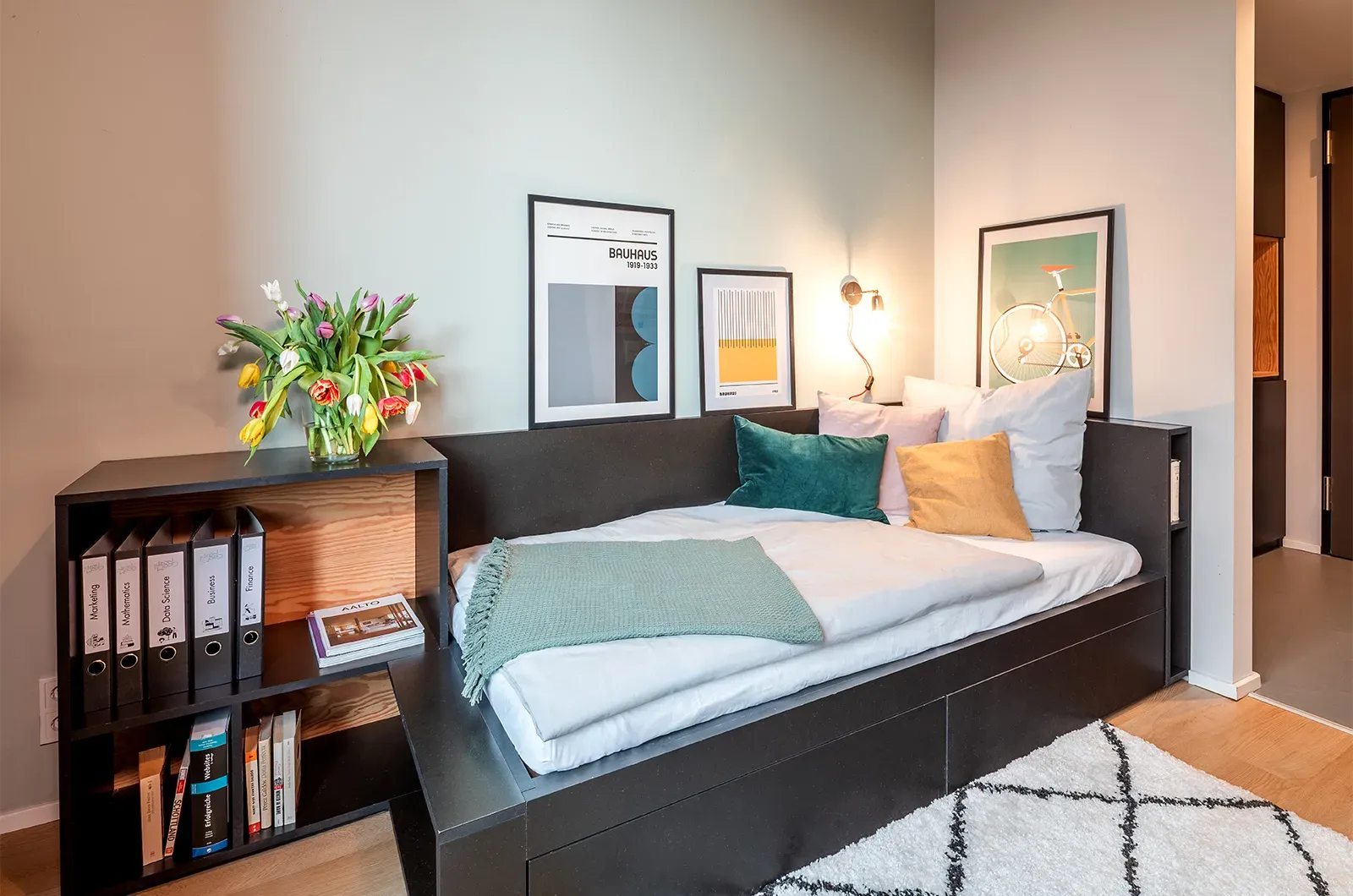 Styled bed area in a Classic Patio Room at Neon Wood Berlin Mitte-Wedding showing decorated sleeping space and personalization example